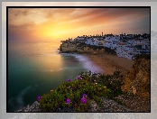 Region Algarve, Domy, Wybrzeże, Portugalia, Kwiaty, Zachód słońca, Morze, Carvoeiro