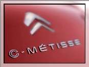 Emblemat, C-Metisse