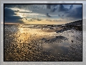 Plaża Dunraven Bay, Wschód słońca, Walia, Morze