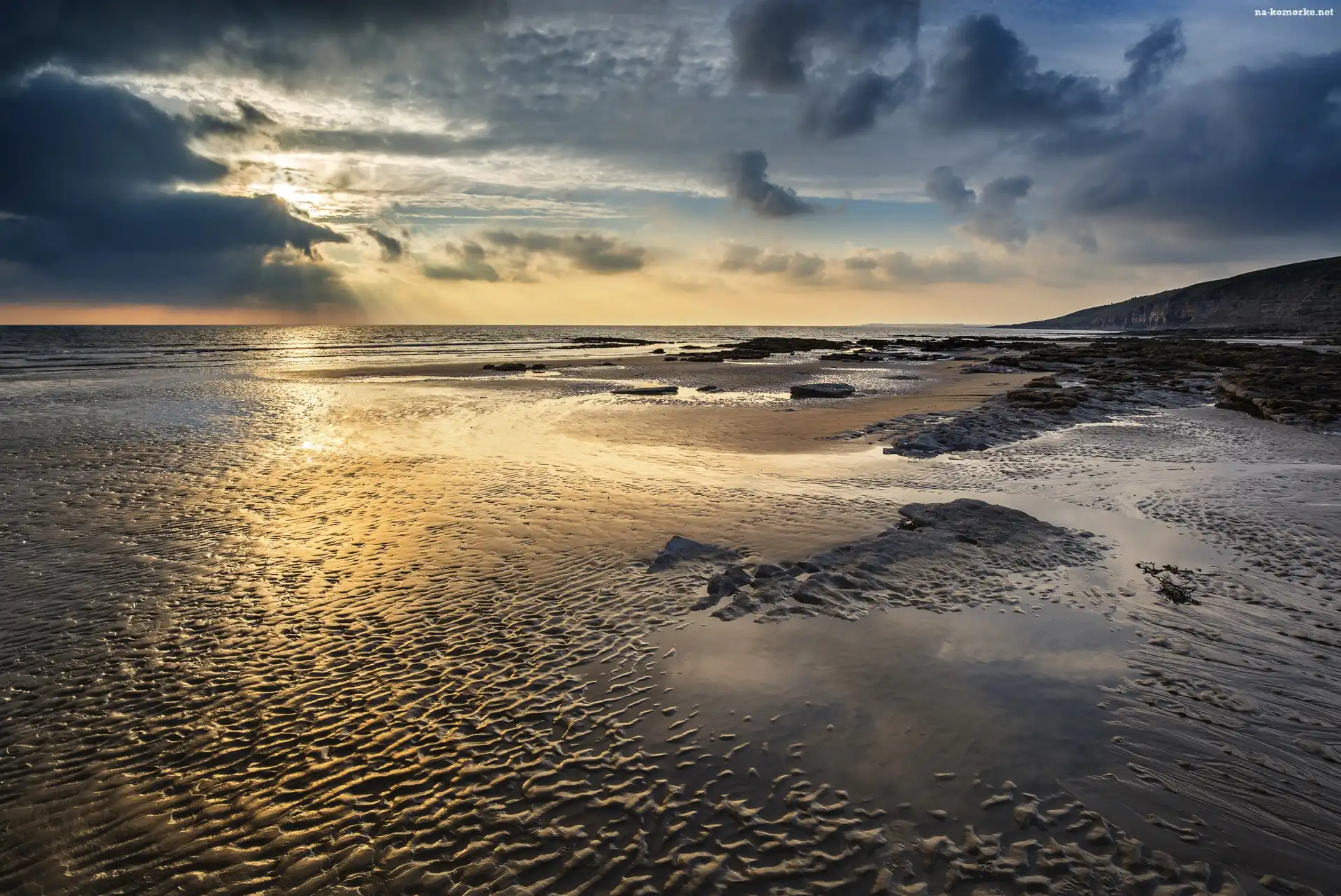 Plaża Dunraven Bay, Wschód słońca, Walia, Morze