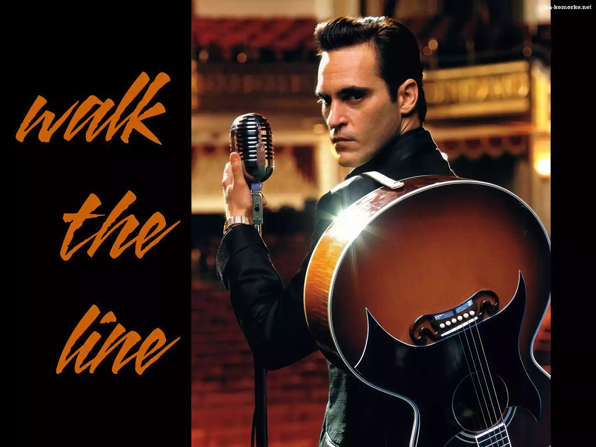 Joaquin Phoenix, mikrofon, gitara